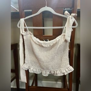 Strapless striped beige and white summer top